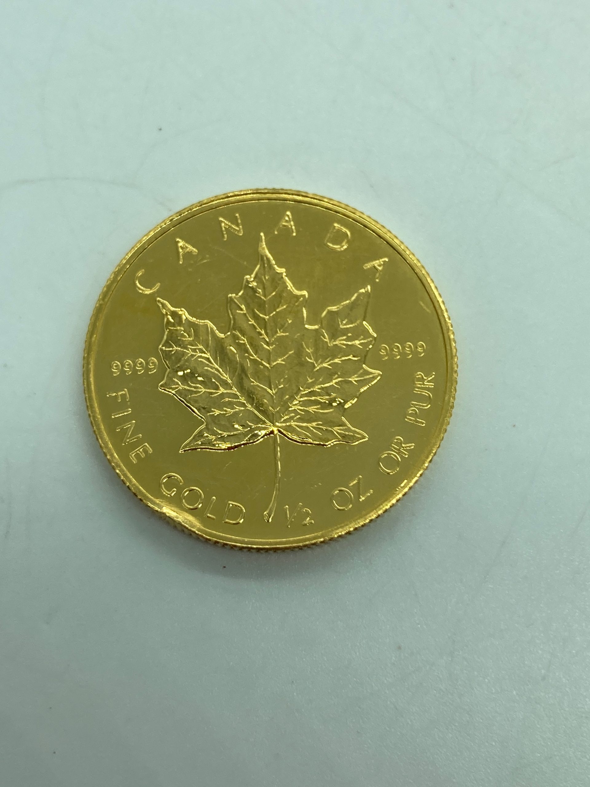 ばら売り可能  999.9 メイプルリーフ 金貨 1/4  1/10 2枚 メイプルリーフ金貨 1/4オンス 純金 24金 7.77g 未使用品 クリア